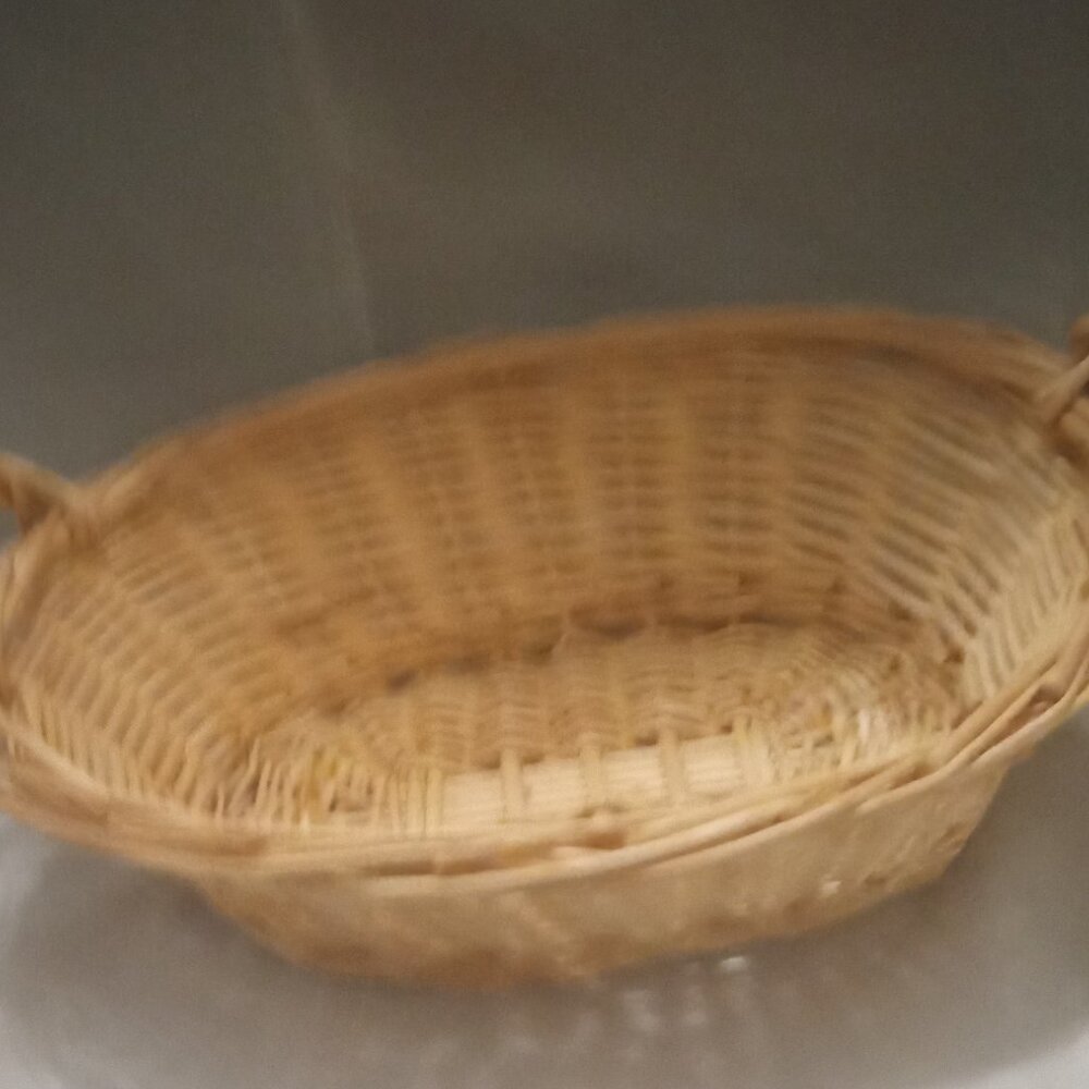 Natural color wicker 5"H 9"W with handles at end